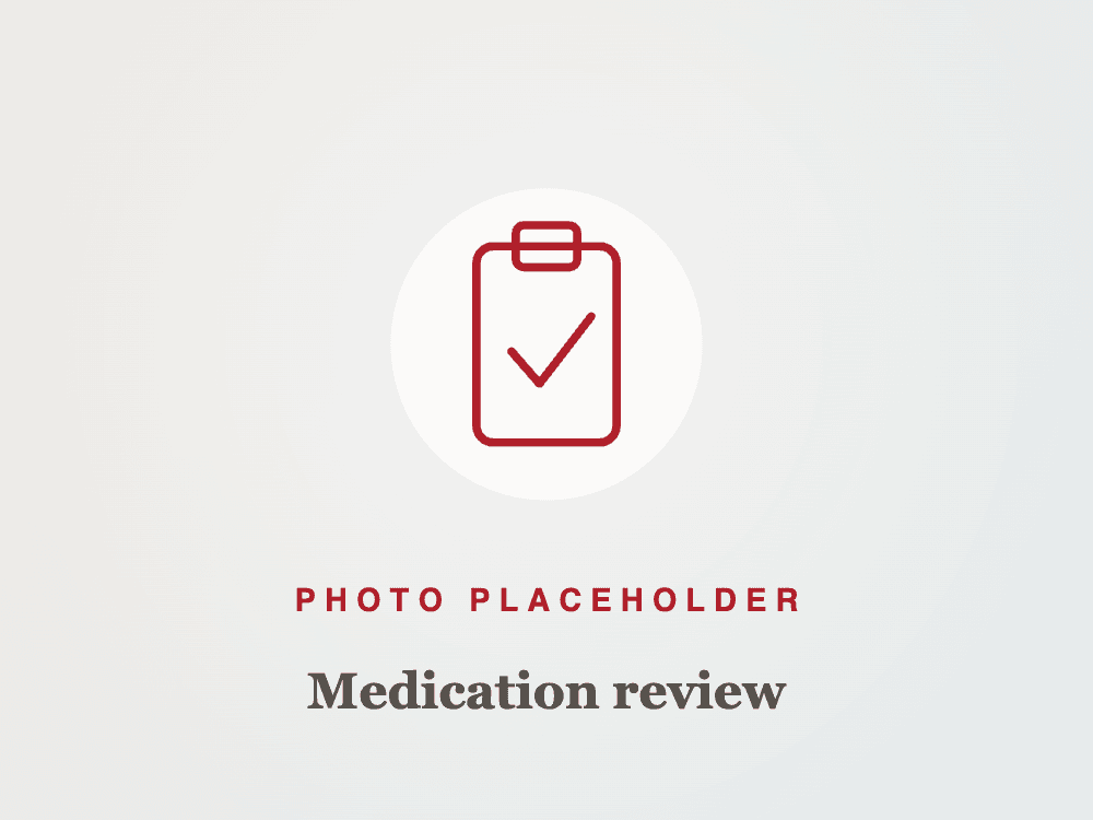 Pharmacist taking time to review medications with a patient